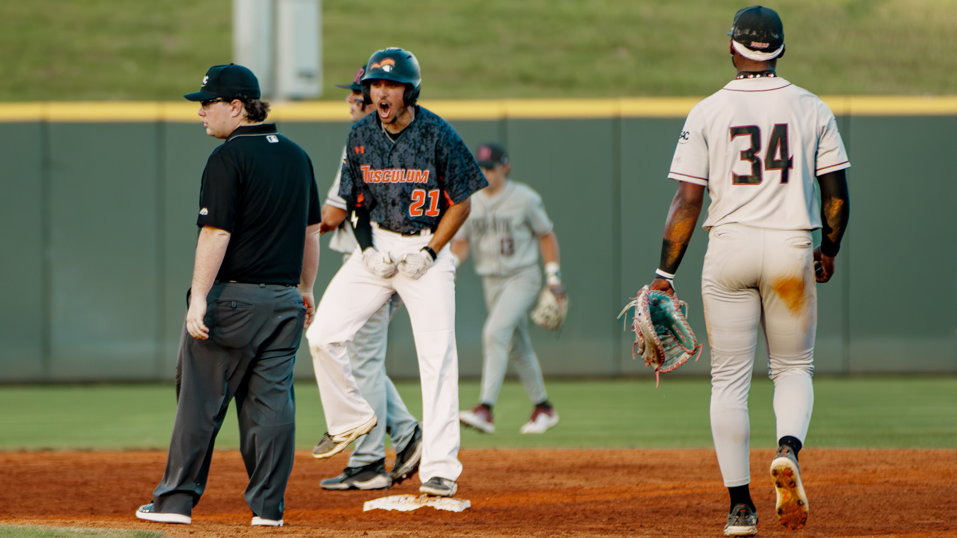Ryan Ortega celebrated one of his two doubles in Tusculum's 12-10 win over No. 19 Lenoir-Rhyne (photo by Kari Ham).