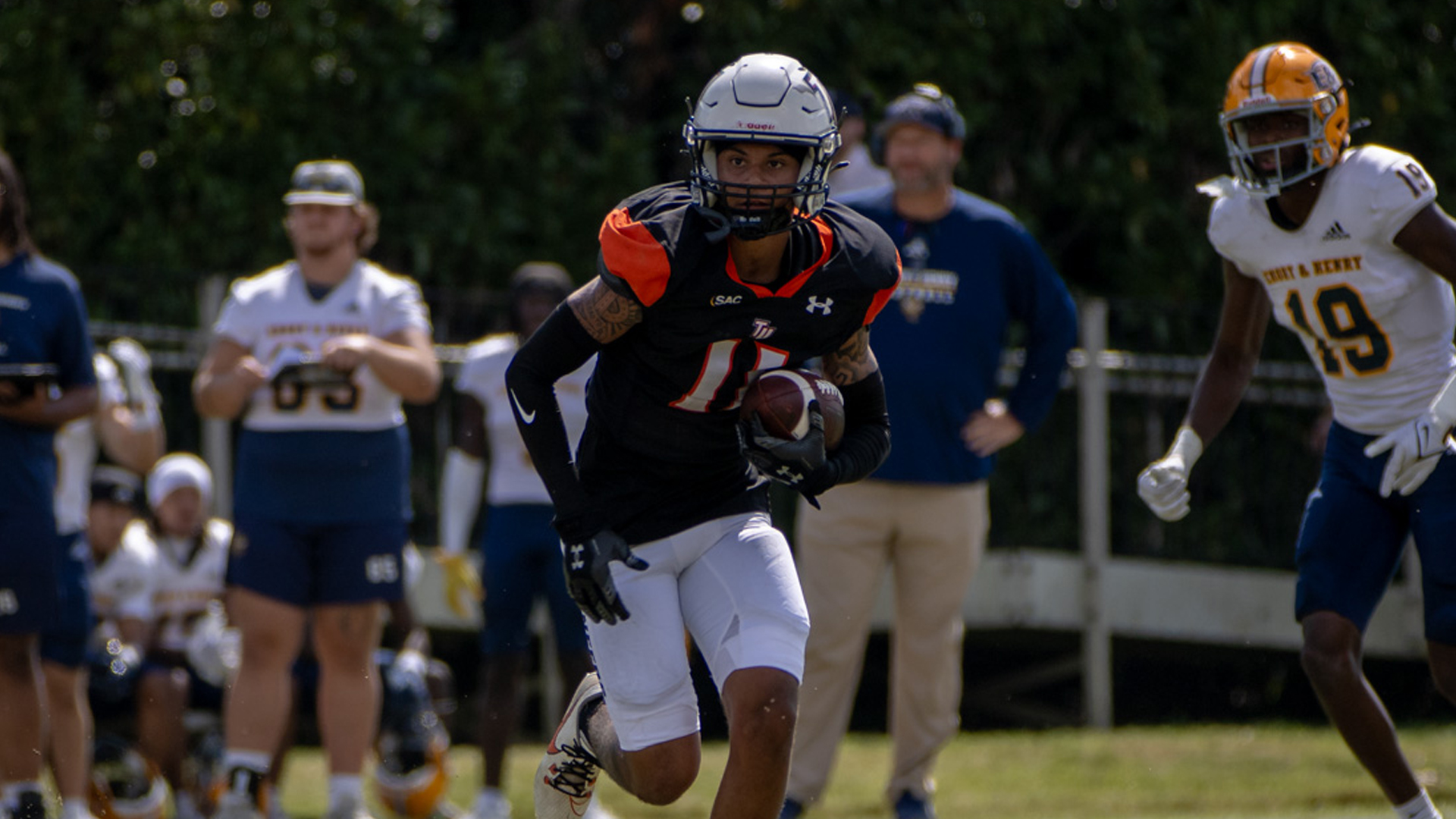 Dayquan Diston records one of his two interceptions against Emory & Henry (photo by Kari Ham)