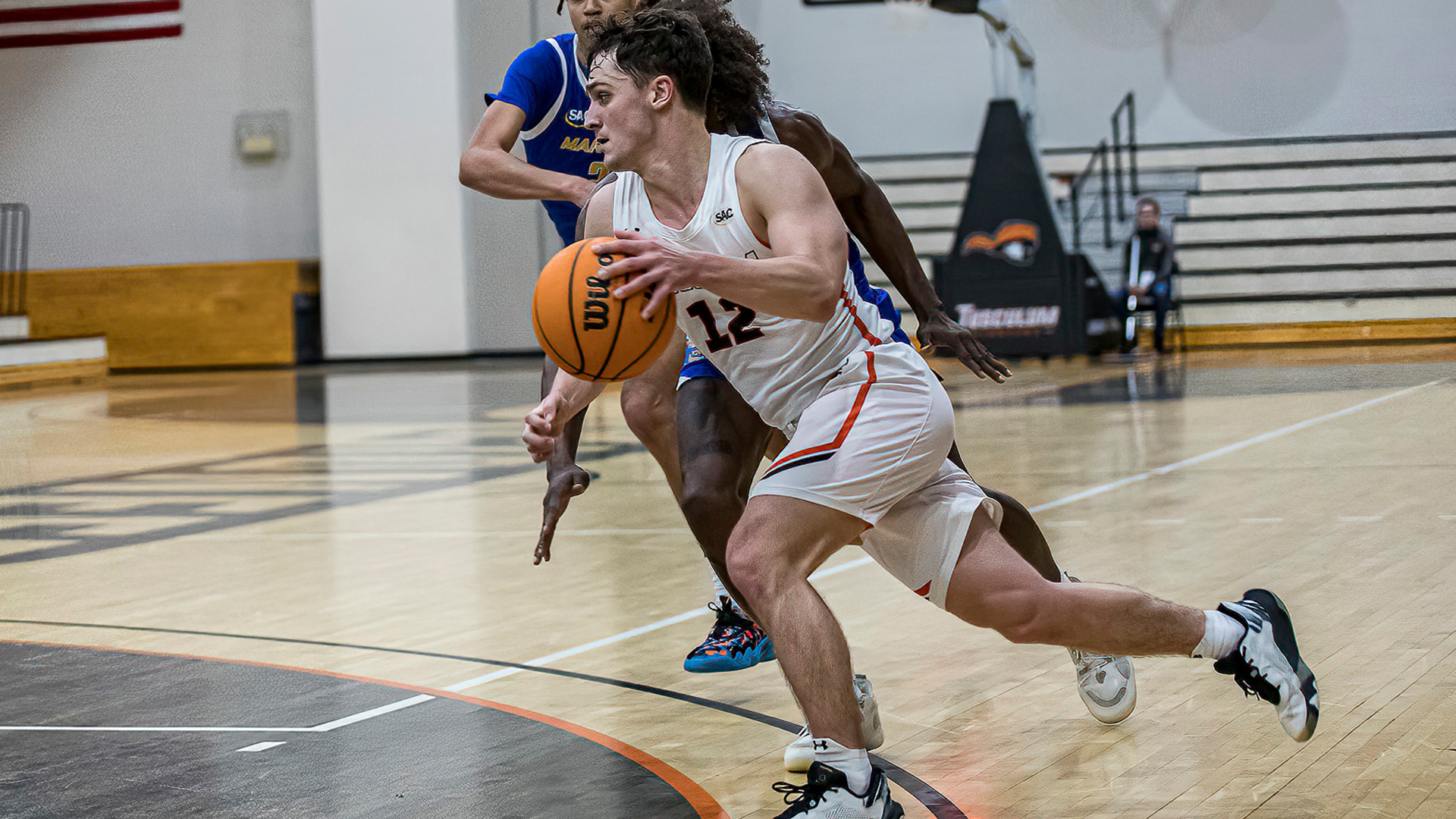 Connor Jordan scored 21 points off the bench in Tusculum's 79-66 win over Mars Hill (photo by Chuck Williams)