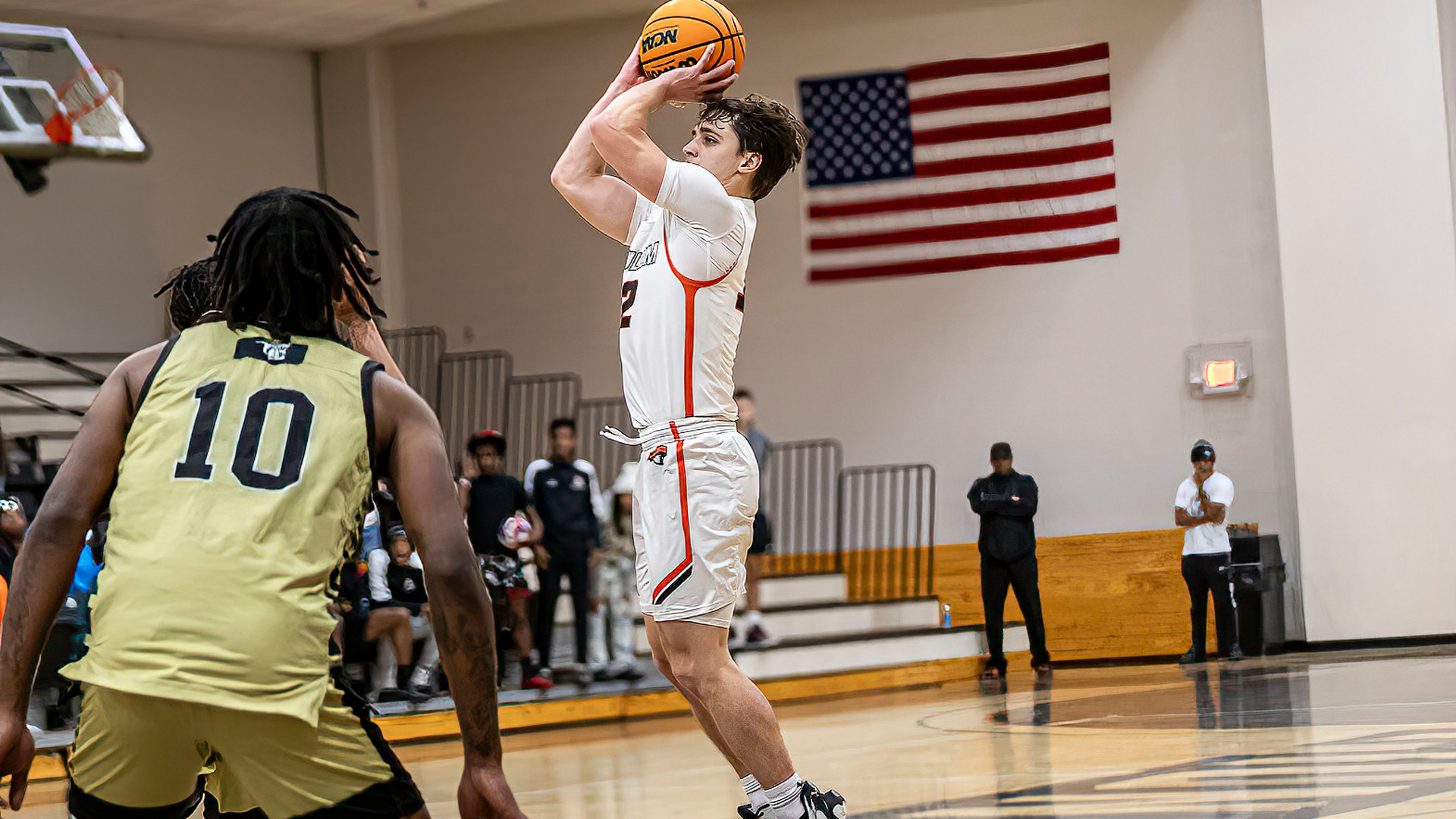 Connor Jordan hits the game-winning bucket with 2.6 seconds remaining in Tusculum's 81-80 win over UNC Pembroke (photo by Chuck Williams)