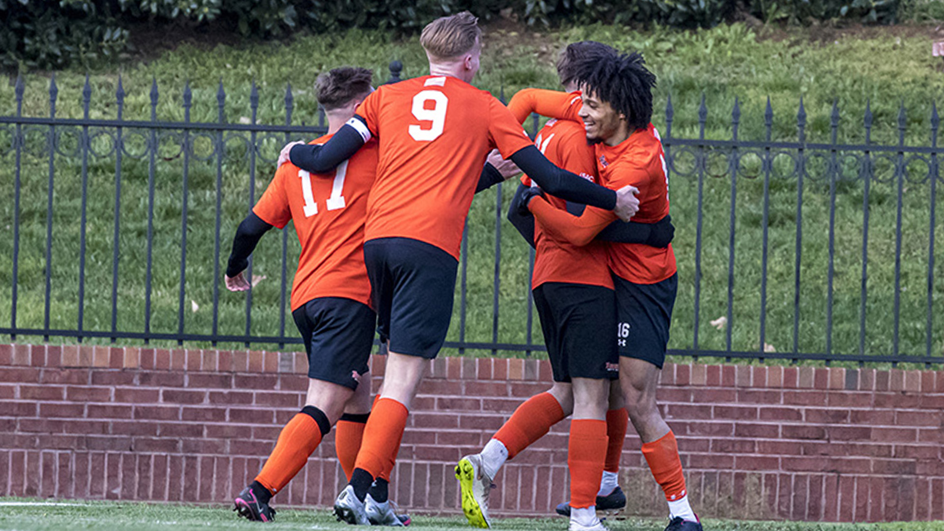 Damien Baltide (right) celebrates after giving the Pioneers a 2-0 lead over Lincoln Memorial (photo by Chuck Williams)