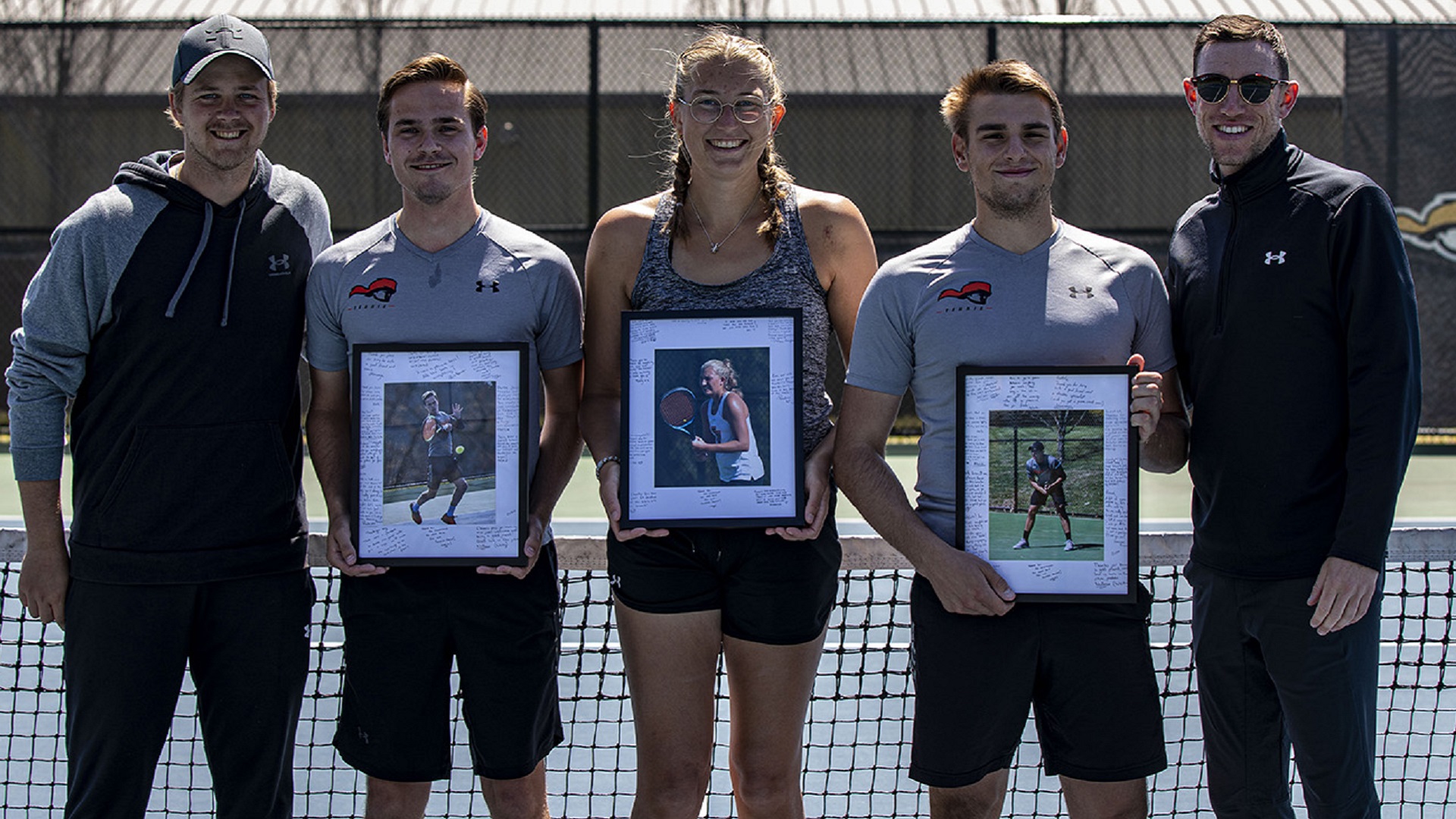 Seniors Jacco Mensinga, Emilie Hansen and Vadzim Raitsou celebrate Senior Day with coaches Will Malm and Matt Frost (photo by Chuck Williams)
