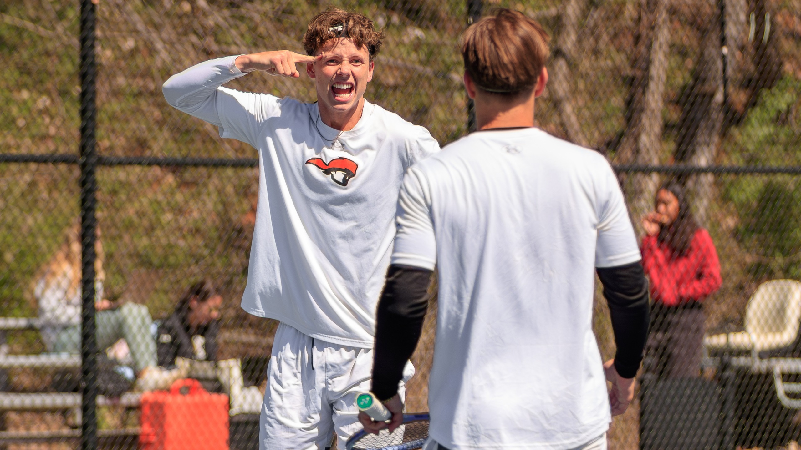 Rens Verhaar (left) celebrates a point with Kai Poelchau during the Pioneers' 4-2 win over Lenoir-Rhyne (photo by Kari Ham)