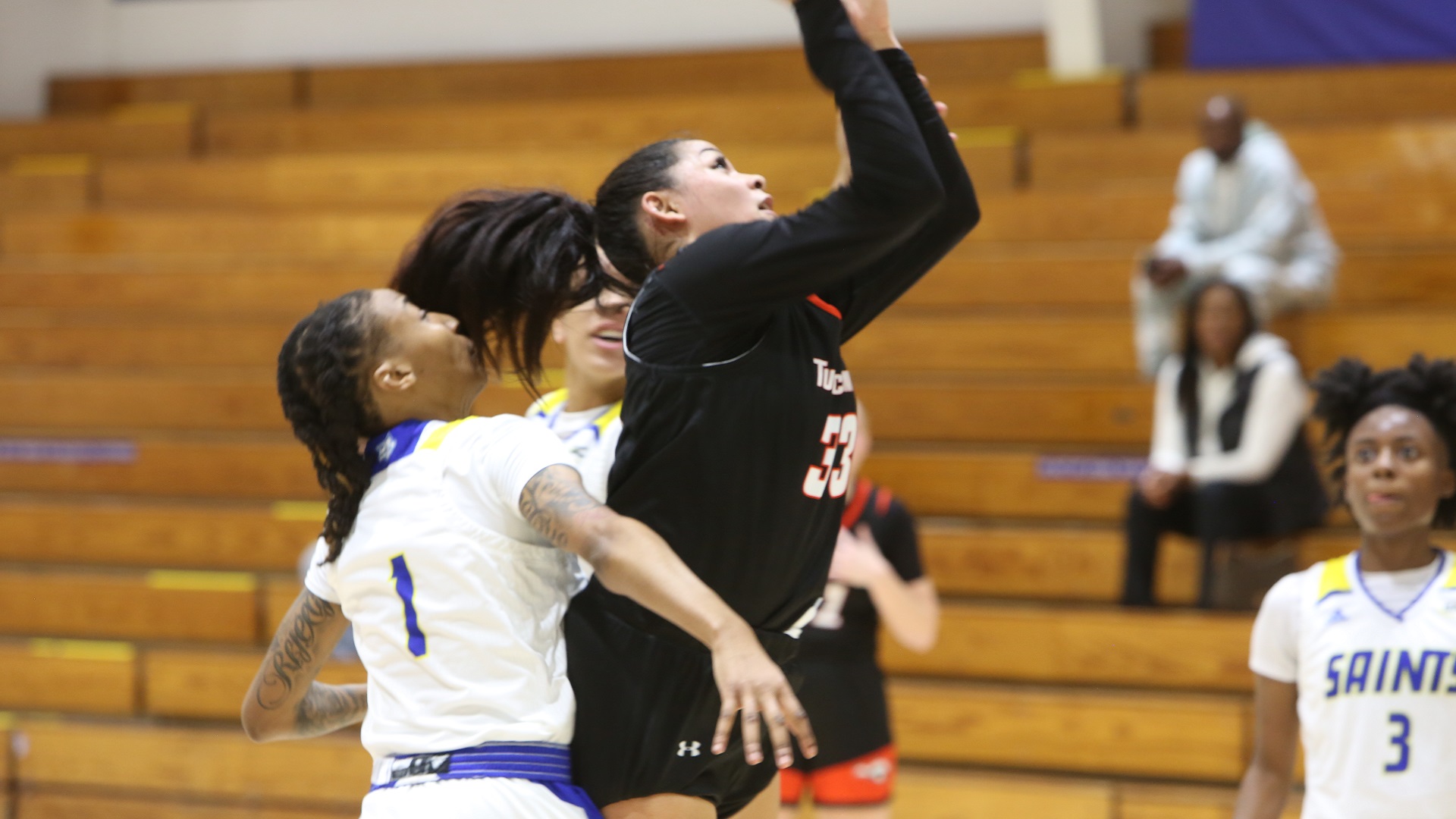 Jami Tham scored 28 points and pulled 14 rebounds for her 15th straight double-double (photo by TU Athletic Communications)