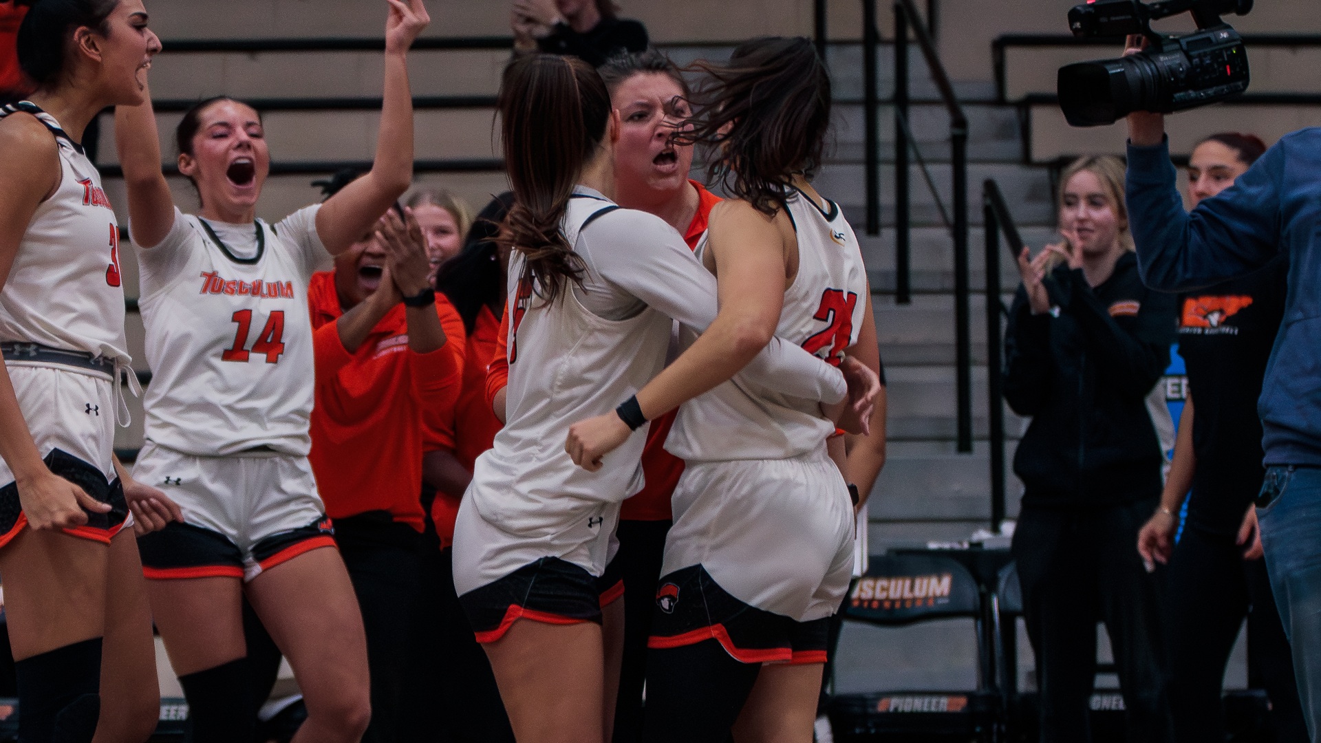 Martina Garofalo (right) celebrates after scoring the game-winning shot against Emory & Henry (photo by Kari Ham)