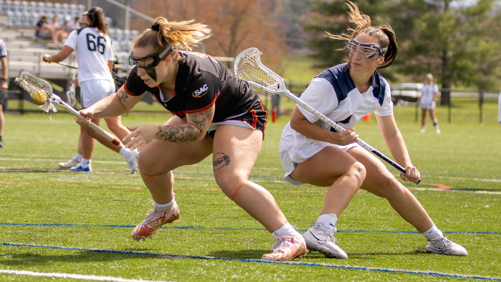 Cassidy Bourne dodges a LMU defender during Wednesday's match (photo by Kari Ham)