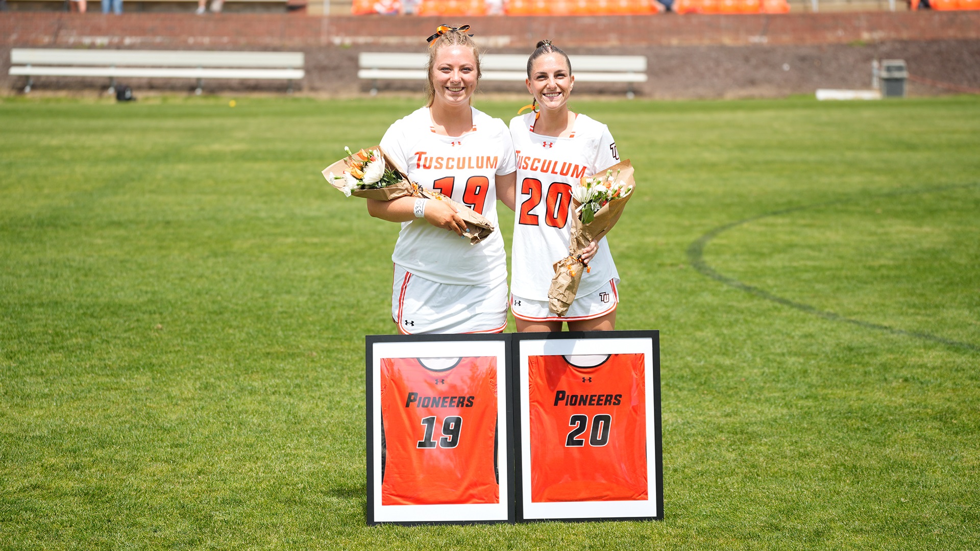 Seniors Cassidy Bourne (left) and Mackenzie Sherrod were honored prior to the game (photo by Joe Yates)