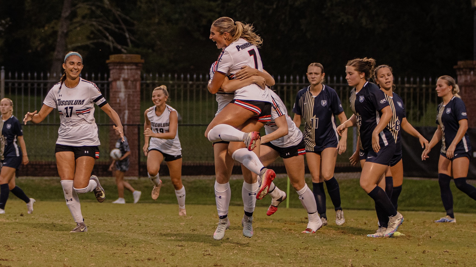 Addison Rishling celebrates with her teammates after scoring the go-ahead goal (photo by Kari Ham)